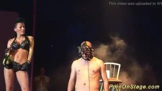 Crazy fetish needle show on stage